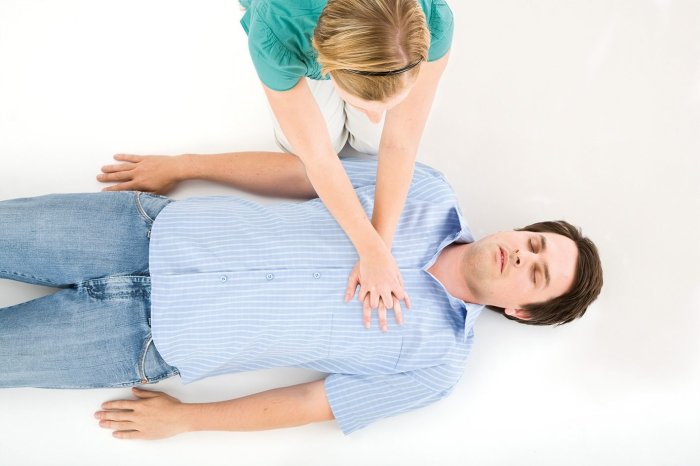 You and another lifeguard are preparing for cpr