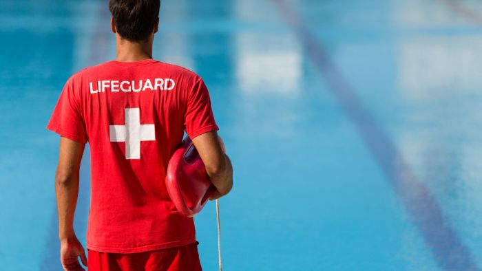 You and another lifeguard are preparing for cpr